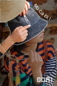 Sản phẩm Mũ lưu niệm hình mõ cá gỗ của Đoài copy-min
